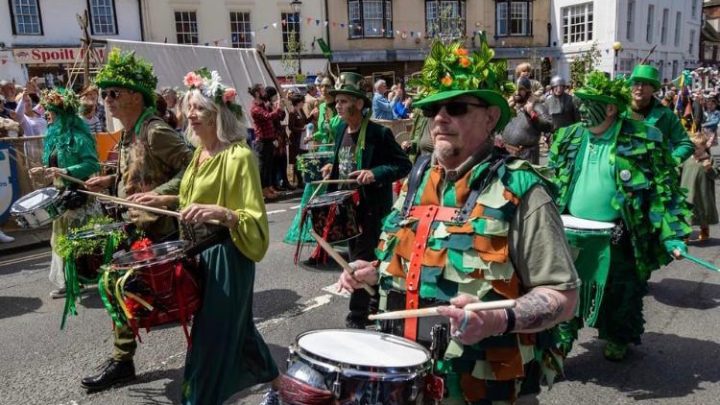 Musicians and performers taking part in a local festival in Battle, East Sussex