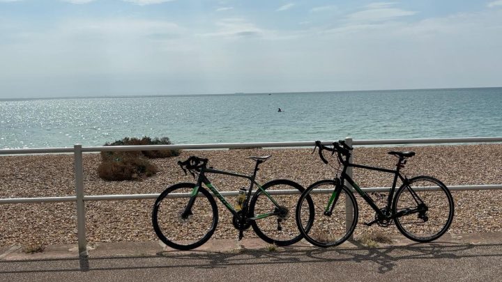 Two bicycles beside the East Sussex coast during a cycling break