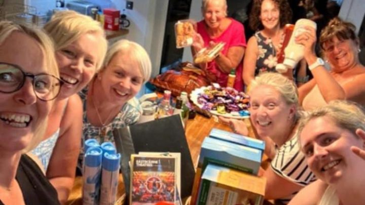Group of friends enjoying time together during a stay at Blackfirs Farmhouse