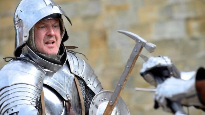 Armoured historical re-enactor taking part in an event near Battle Abbey